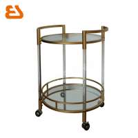 Metal and glass trolley with mirror decoration for dining room